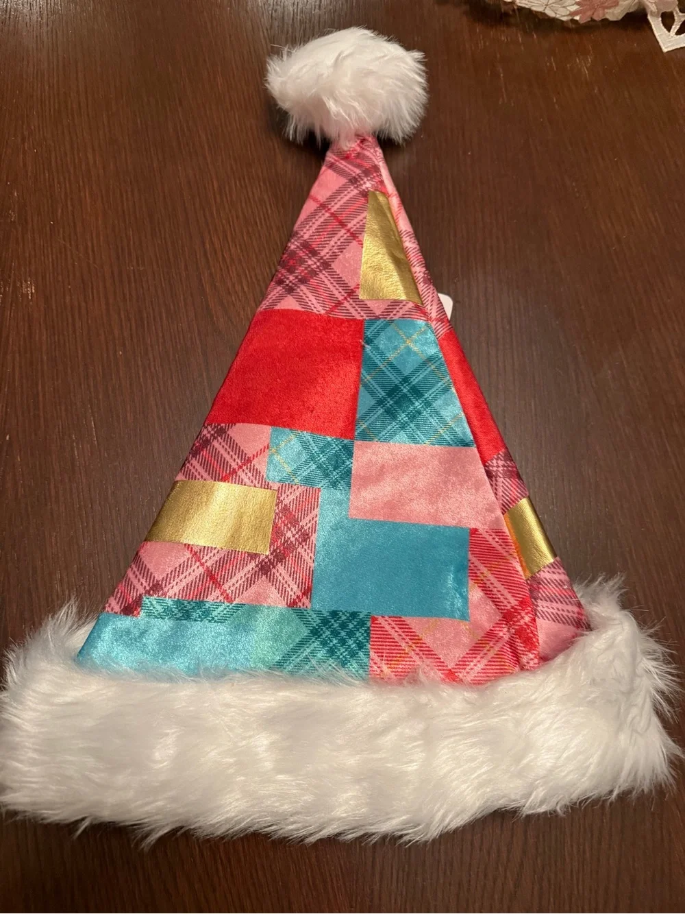 Dllly Parton Holiday Coat of Many Patchwork Santa Hat White Faux Fur Trim